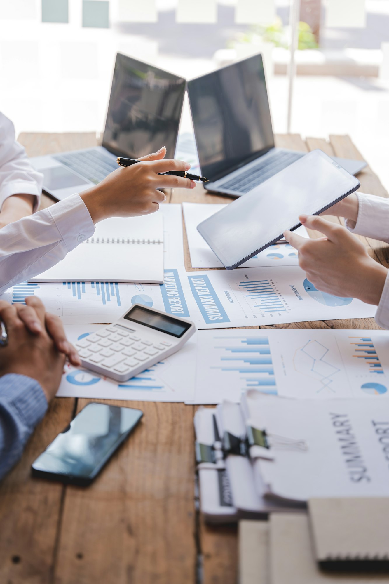 The financiers are calculating personal taxes for their customers.